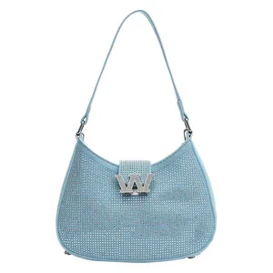 Light blue rhinestone shoulder bag with silver W emblem and glossy crystal finish