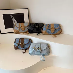 Retro denim underarm bags collection with leather patchwork and gold metal buckles