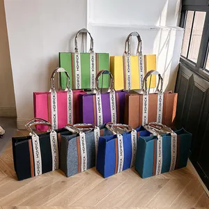 Large felt tote bag with MOMPICK letter straps available in nine vibrant colors