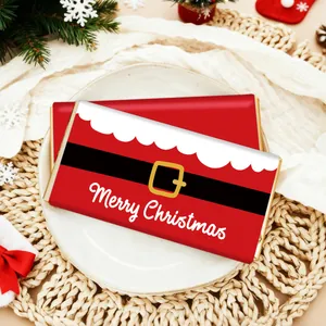 Close-up of Christmas chocolate bars in Santa suit wrapping with Merry Christmas text