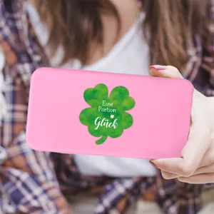 Coque de téléphone rose avec trèfle vert et texte Eine Portion Glück en main