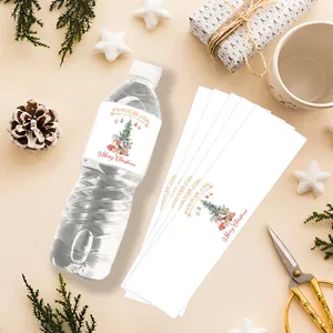 Macro view of Christmas water bottle labels with hand-drawn trees and festive decorations