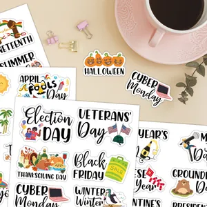 Flat lay of colorful English holiday planner stickers for scrapbooking and decoration