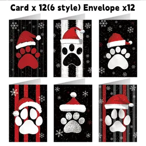 Detail of 12 Christmas cards featuring 6 dog paw designs with envelopes for party gifts