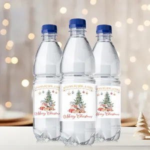 Christmas water bottle labels featuring watercolor festive trees and rocking horse decorations