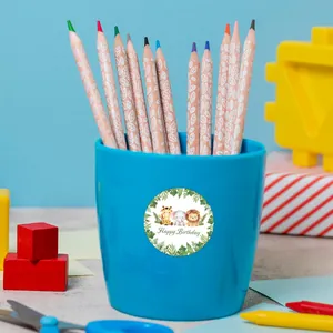 Detail showing a watercolor jungle animal birthday sticker on a blue plastic party cup