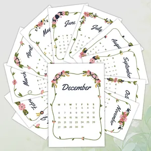 Artistic fan-shaped layout of 2026 monthly calendar cards with floral vine borders
