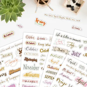 Set de stickers mensuels pour agenda avec polices artistiques dans les tons Morandi doux