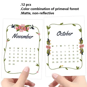Detail of 12pcs minimalist matte 2026 calendar cards featuring forest floral vine borders