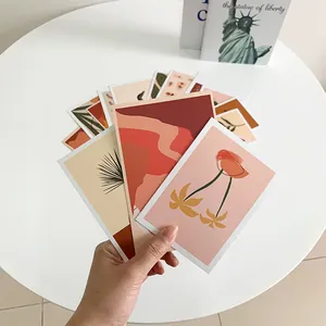 Artistic warm-toned postcards set for wall decor featuring abstract floral patterns