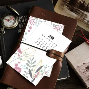 Minimalistische bloemenkalender 2026 met april-indeling en botanische ontwerpen