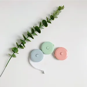 Mini retractable tape measure set in pastel blue, mint green, and soft pink colors