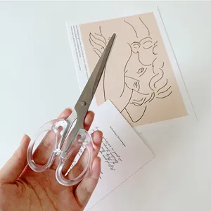 Ciseaux de bureau en acier inoxydable avec poignées transparentes au style minimaliste