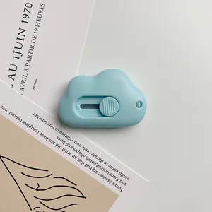 Light blue cloud-shaped mini utility knife with sliding metal blade for box opening