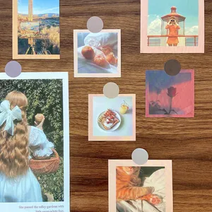 Retro style decorative postcards with vintage aesthetic and floral patterns on dark wood