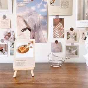 Artistic room decor set with a wooden easel and minimalist wall posters for aesthetic vibes