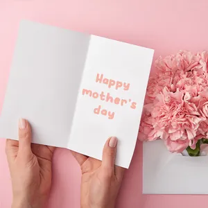 Pink Happy Mother's Day greeting card with carnations on a soft pink background