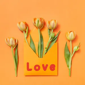 Orange love letter envelope with five realistic tulips for creative gift decoration