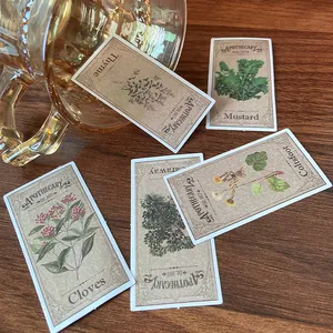 Vintage apothecary style botanical stickers with plant illustrations on dark wood table