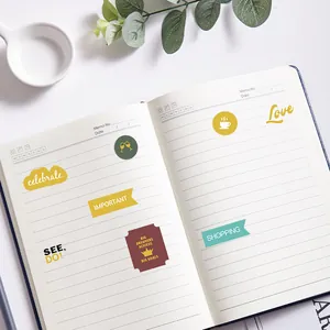 Autocollants de planificateur d'affaires avec icônes et étiquettes sur carnet à spirale