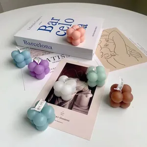 Colorful cube bubble scented candles in pastel tones for home decor and photography