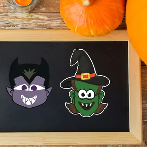 Cartoon Halloween magnet stickers set featuring a vampire and witch on a black board