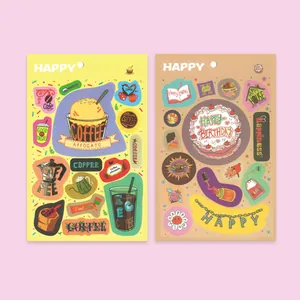 Detail van twee vellen cartoonstickers met koffie- en verjaardagstaart handgetekende ontwerpen