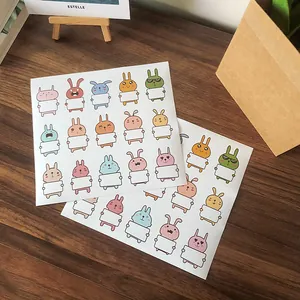 Cute animal name stickers with 15 bunny designs for kids stationery on wood table