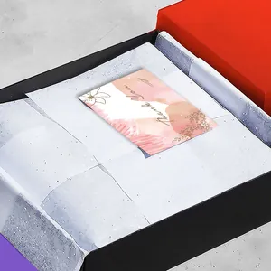 Elegant red and black gift box with Thank You card and white tissue paper padding