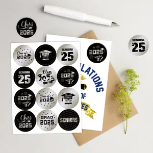 Macro view of Class of 2025 graduation stickers on gift cards with black and silver motifs