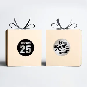 Detail of Class of 2025 graduation gift boxes with black ribbons and senior theme logos