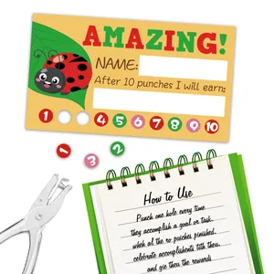 Macro detail of ladybug reward cards with a metal puncher for students' behavior tracking