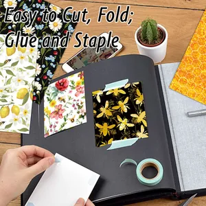 Detail of decorative scrapbooking paper with lemon and bee motifs for DIY albums