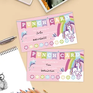 Macro detail of unicorn rewards punch cards for students with colorful stationery