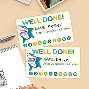 Detail of shark reward punch cards for kids with names and colorful goal tracking circles