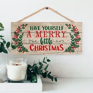 Detail eines rustikalen Weihnachtsholzschilds mit Merry Little Christmas Text und Beeren