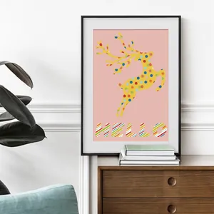 Modern framed wall art with yellow elk and HELLO text on a pink background