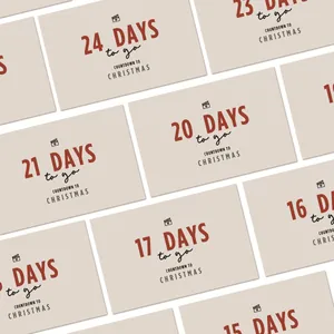 Set of 24 Christmas countdown cards in beige cardstock with festive movie clapperboard