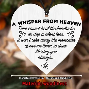 Close-up of heart-shaped wooden memorial plaque with dimensions 10cm x 0.3cm