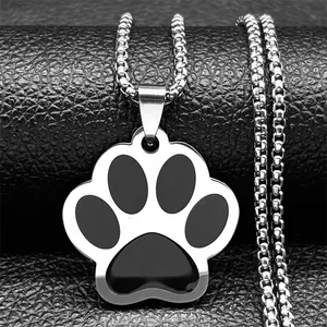 Minimalist silver steel pet paw pendant with black enamel on textured black leather