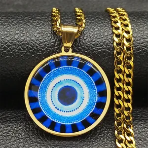 Detailed macro shot of a golden Evil Eye pendant on a thick Cuban chain over black leather