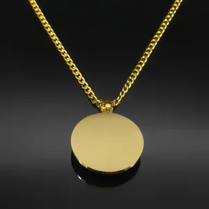 Polished gold stainless steel necklace with a minimalist round disc pendant and curb chain