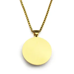 Elegant gold stainless steel necklace featuring a large brushed round pendant and box chain