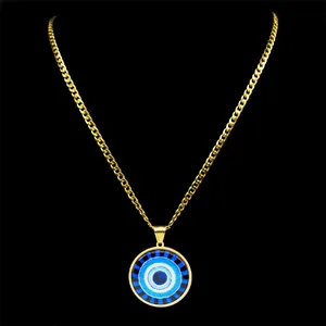 Golden Cuban chain necklace featuring a blue evil eye pendant on a black background
