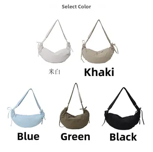Selection of crescent dumpling bags in five colors with functional side drawstrings