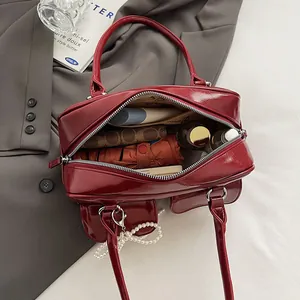 Retro burgundy shoulder bag with pearl chain and dual pockets shown in large capacity view