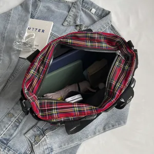 Retro plaid tote bag with large capacity showing items like a tablet and an umbrella