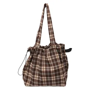 Retro plaid tote bag in coffee and beige with drawstring closure and long shoulder straps