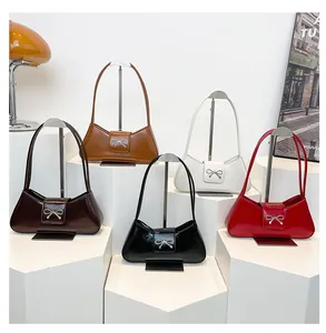 Borse a spalla in pelle lucida minimaliste con fibbie a fiocco argento in cinque colori