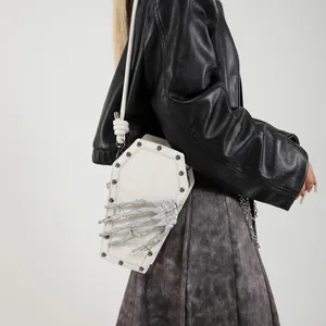 White coffin-shaped PU shoulder bag with silver studs and skeleton hand detail
